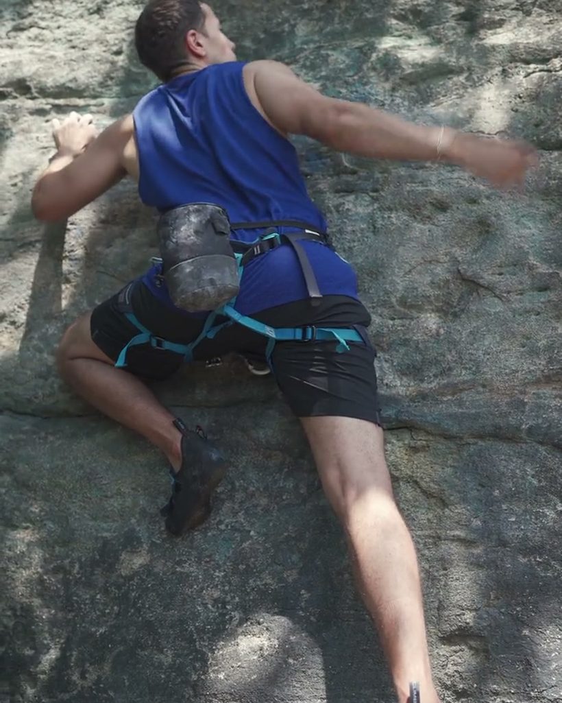 A climber on a steep board